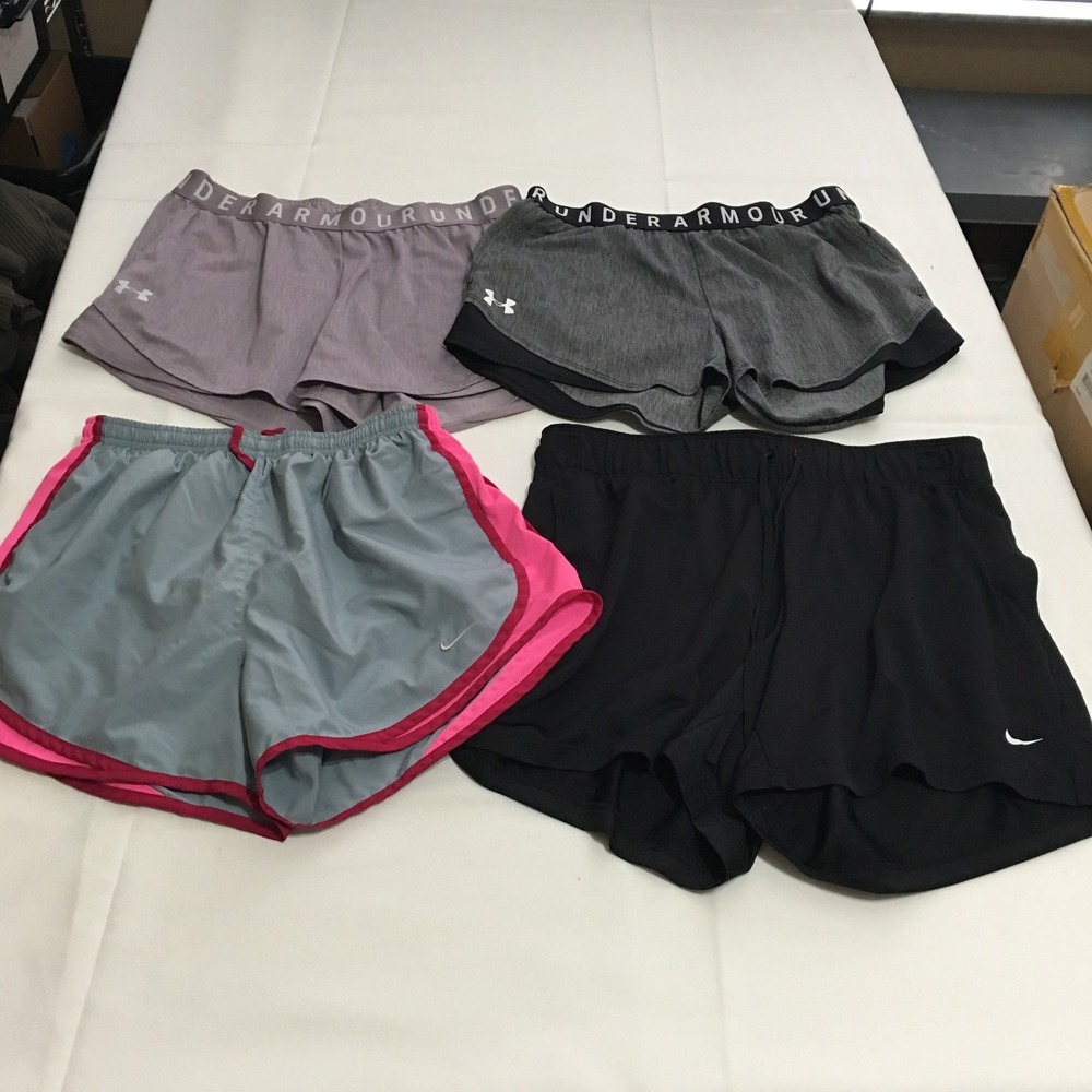 Lot of 4 Nike and Under Armour Running Shorts Womens Medium Multicolor Athletic